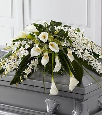 The FTD® Angel Wings Casket Spray
